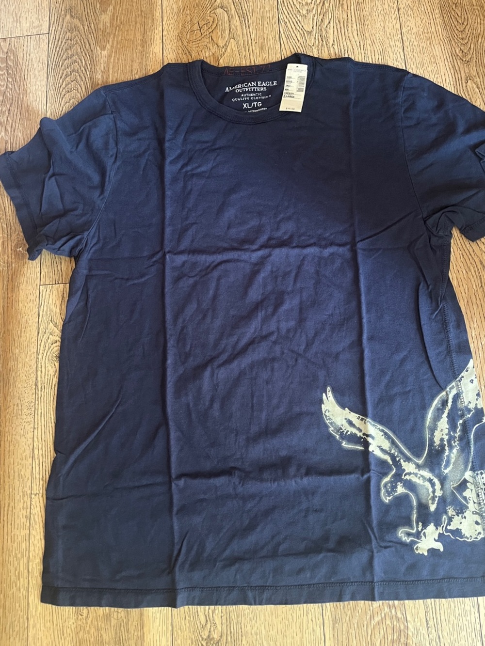 American Eagle Outfitters Navy Tee with Cream Eagle Accent